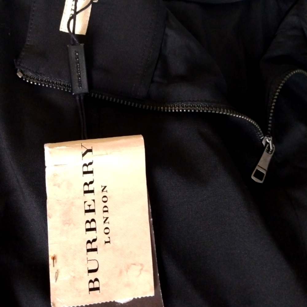 Burberry knee length skirt.